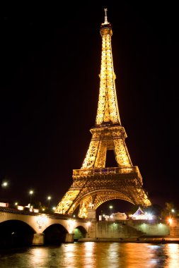 Eiffel tower illuminated at night