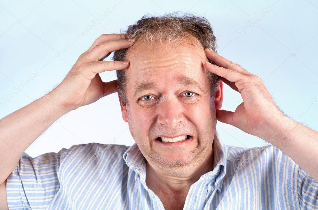 Man Suffering from a Headache