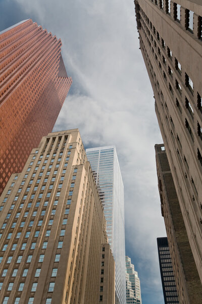 A view of Toronto skyscrapers while looking up from the street.