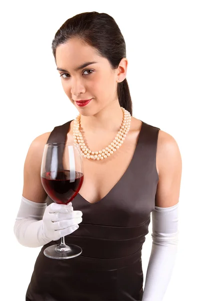 Előkelő asszony gazdaság egy pohár vörös bor — Stock Fotó