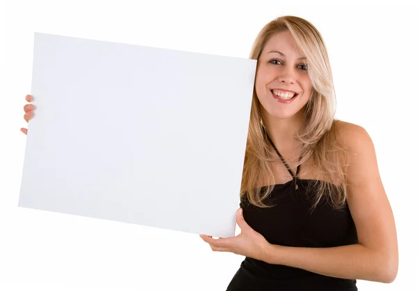 年轻女子持有一个空白的白色标志 — 图库照片