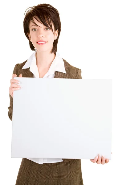 Geschäftsfrau mit weißem Schild — Stockfoto
