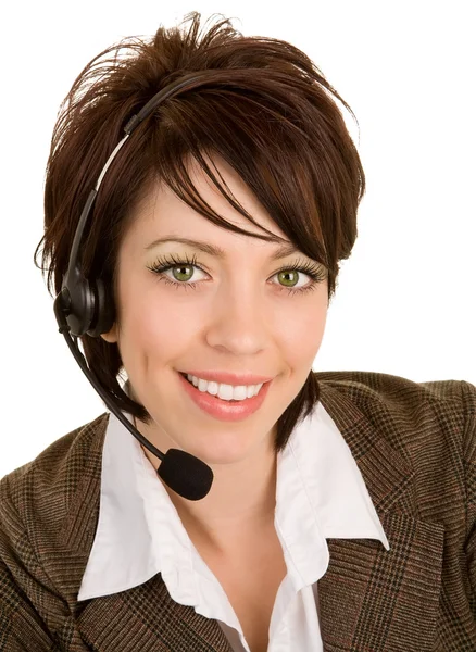 Szép mosolygó nő fejhallgatós mikrofont viselő — Stock Fotó