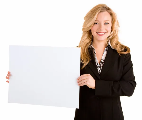 Fiatal nő tartja egy üres fehér jele Stock Kép