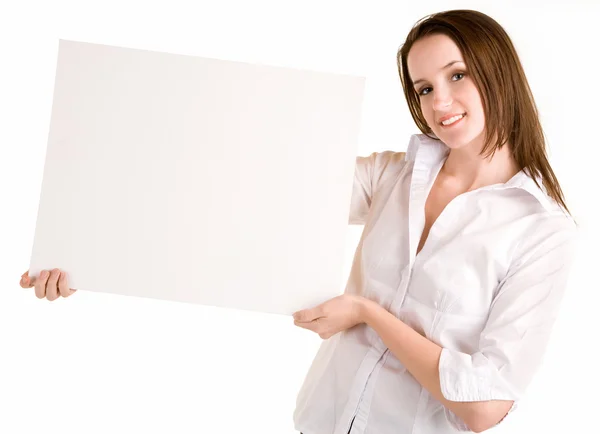 Junge Frau hält ein leeres weißes Schild — Stockfoto