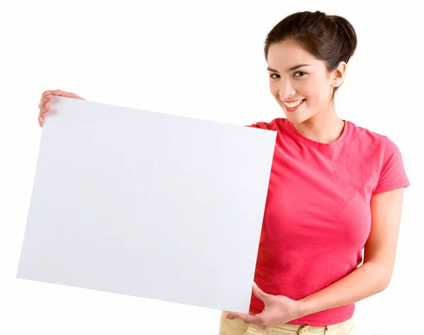Mujer sosteniendo un signo blanco en blanco — Foto de Stock