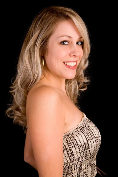 Schöne blonde Dame in einem beigen Kleid — Stockfoto
