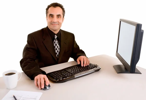 Ler affärsman som arbetar vid sitt skrivbord — Stockfoto