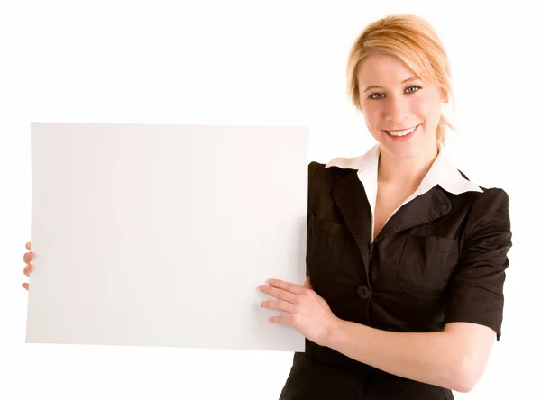 Mujer joven sosteniendo un signo blanco en blanco —  Fotos de Stock