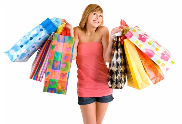 Jonge vrouw op een shopping spree Stockafbeelding