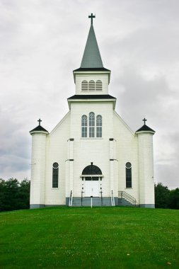 Country Church Under a Stormy Sky clipart