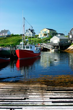 Fishing Village Under a Blue Sky clipart