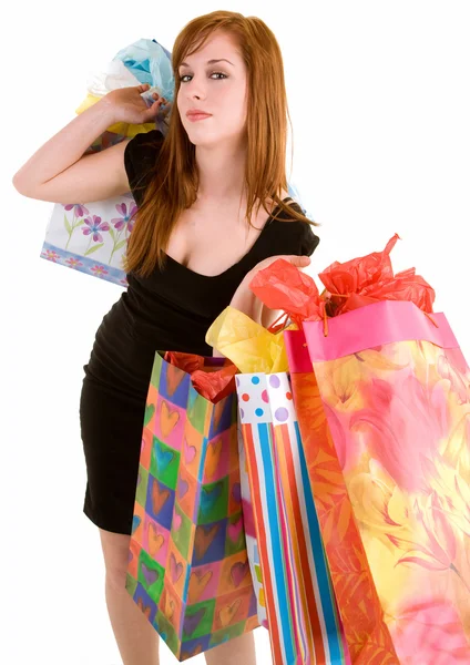 Mujer joven en una juerga de compras — Foto de Stock