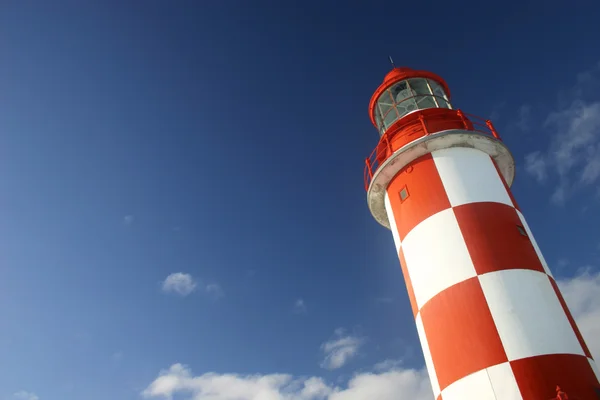 Lighthouse Under a Deep Blue Sky — Stock Photo, Image