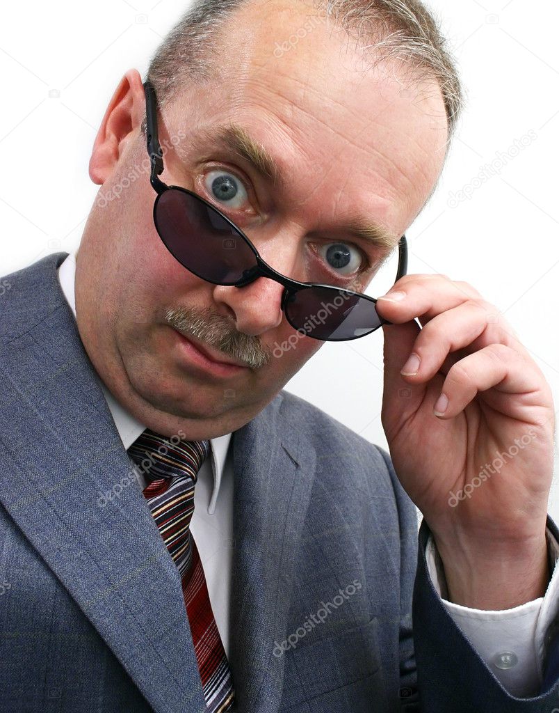 Businessman Takes Sunglasses Off