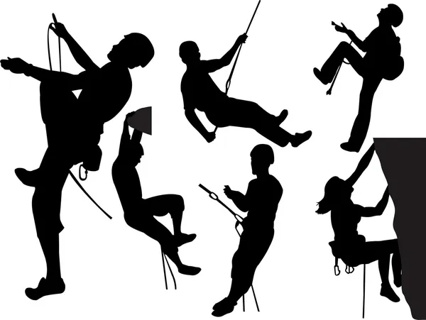 Rock climbers silhouettes — Stock Vector