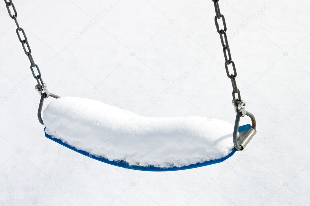 Playground swing in snow