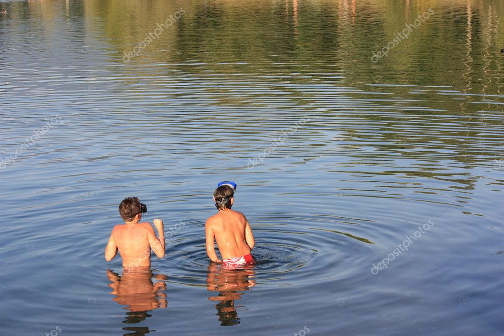 Swimming in a mountain lake — Stock Photo © marysandre 1984118