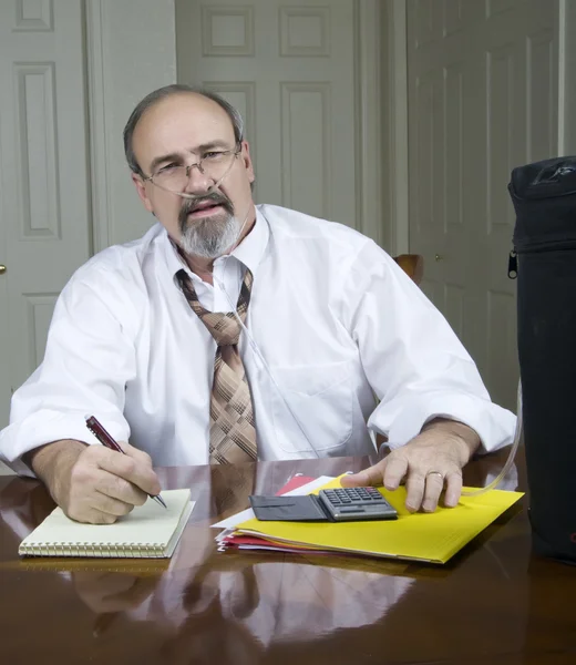 Businessman with a breathing disability. — Stock Photo, Image