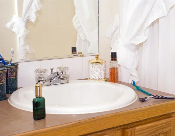 Bathroom sink and toothbrush — Stock Photo, Image