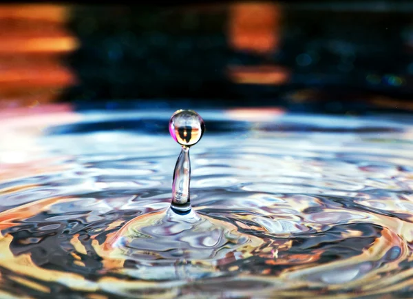 Muticolored water drop — Stock Photo, Image