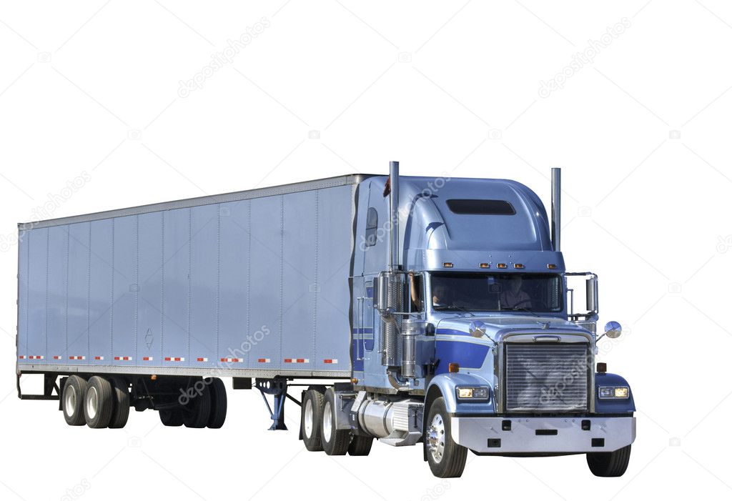 Woman truck driver moving a trailer