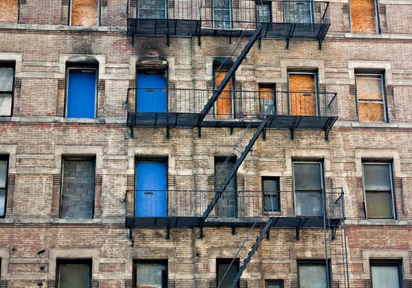 Boarded-up Tenement Building Stock Photo