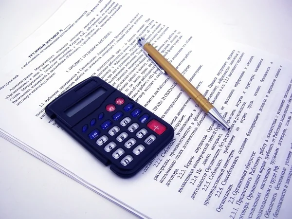 Calculator with pen Stock Picture