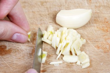 Chopping the Garlic clipart