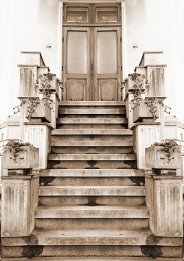 Old entry in a house. Sepia clipart