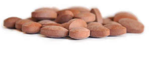 beyaz zemin üzerine vitamin