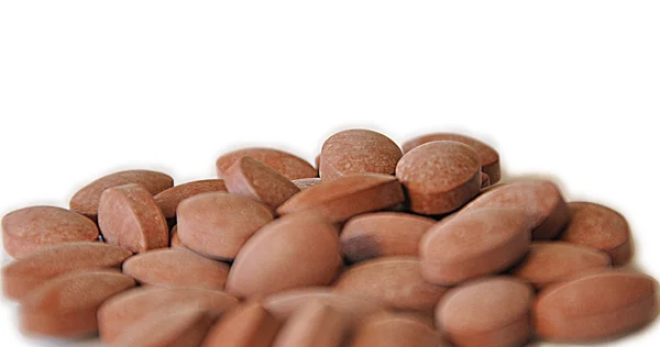 beyaz zemin üzerine vitamin