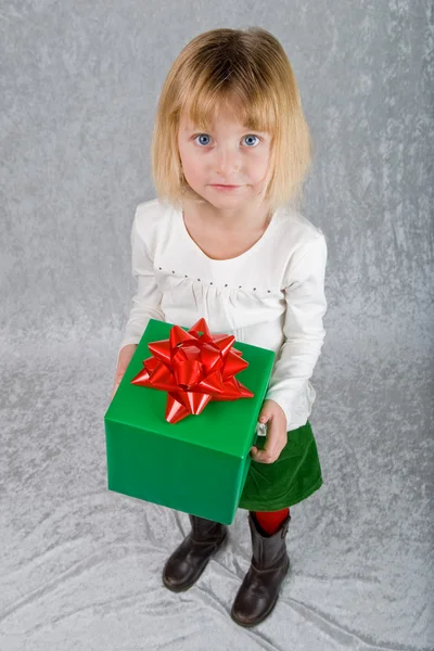 Young Girl Holds Christmas Present — Stock Photo, Image
