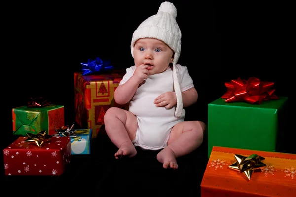 Baby Sitting Amongst Christmas Gifts — Stock Photo, Image