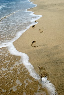 Footprints Washing Away clipart