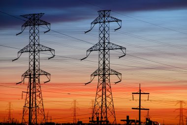 Electrical Towers with Colored Sky clipart