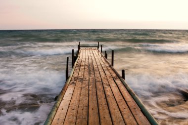 Pier at sunset clipart