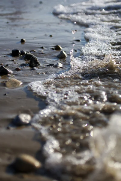 Відпочиньте під плюскіт хвиль море — стокове фото