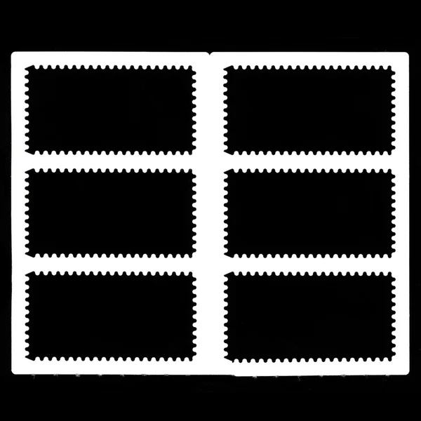 Quadro de selos em um fundo preto — Fotografia de Stock