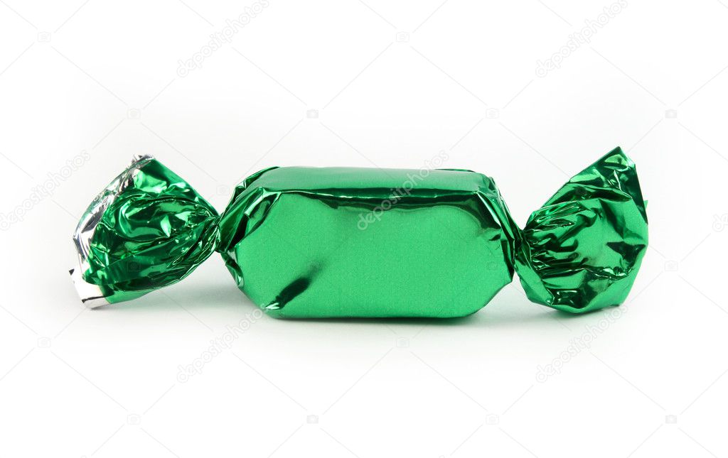 Single green candy isolated