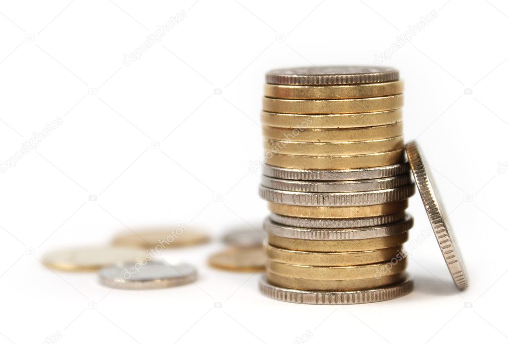 Coin money in stacks isolated