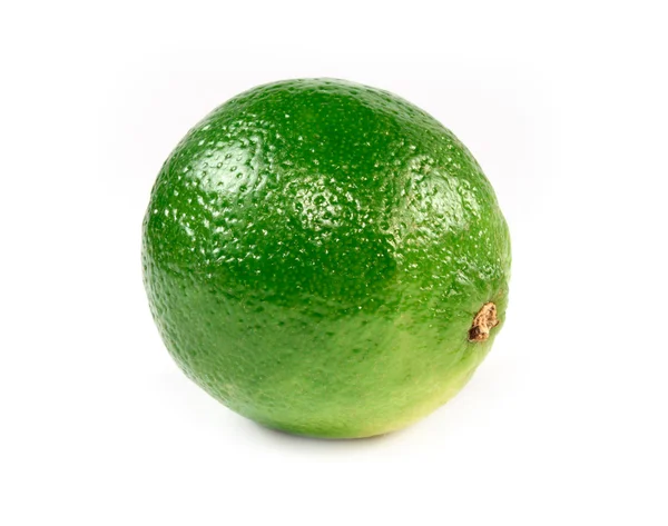 Frische grüne Zitrone isoliert — Stockfoto