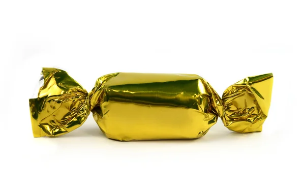 分離された単一の金キャンディー — ストック写真