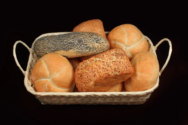 Bread rolls in a basket — Stock Photo, Image