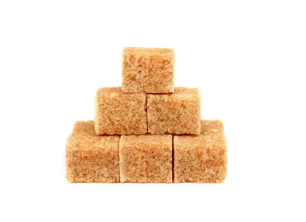 Izole kahverengi şeker cubes — Stok fotoğraf