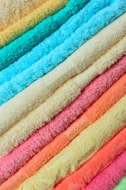 Stacked colorful towels clipart