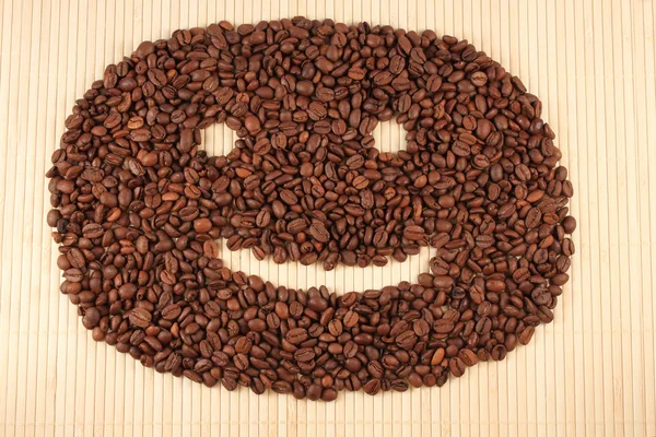 Šťastný úsměv ze zrnkové kávy. — Stock fotografie