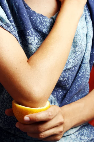 Woman making an elbow treatment — Stock Photo, Image
