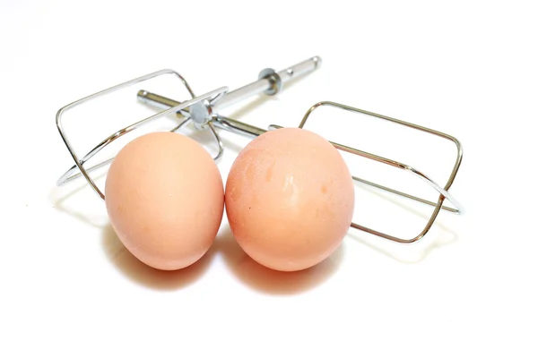 Яйца и часть смесителя — стоковое фото