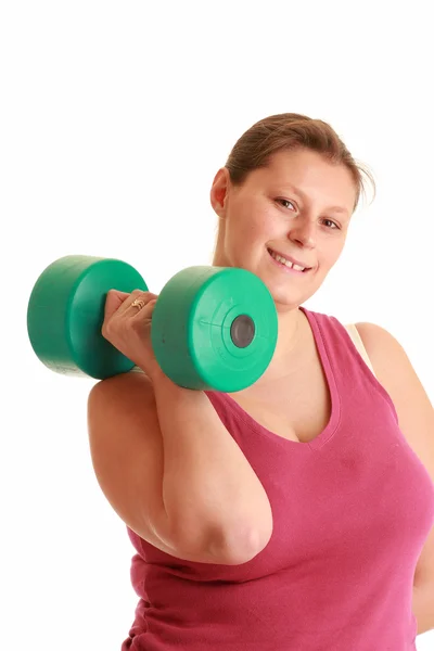Jonge vrouw oefenen met gewichten — Stockfoto